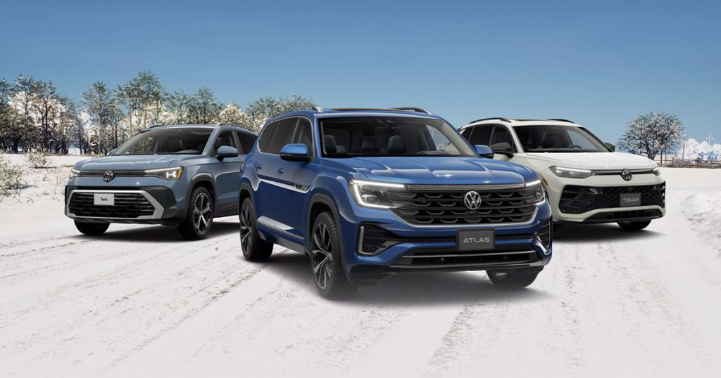A lineup of Volkswagen models in a winter setting.