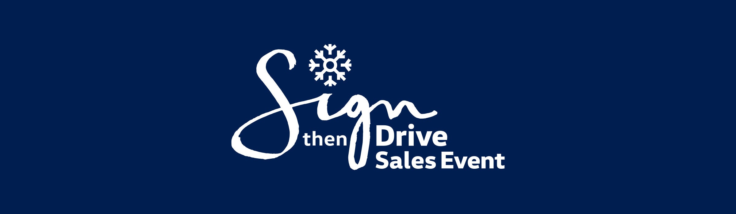 Volkswagen Sign then Drive Sales event banner featuring multiple VW models on display and winter holiday decorations
